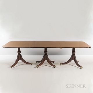 Triple-pedestal Mahogany Dining Table, early 20th century, with acanthus-capped and reeded legs, ht. 29 1/4, wd. 108 1/2, dp. 49 1/2, w