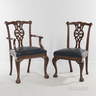 Ten Georgian-style Mahogany Dining Chairs, 20th century, comprising of two armchairs and eight side chairs each with a reticulated spla