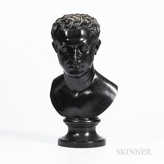 Wedgwood & Bentley Black Basalt Bust of Cato, England, c. 1775, mounted atop a waisted circular socle, impressed mark, ht. 19 in.