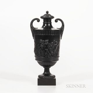 Wedgwood & Bentley Black Basalt Vase and Cover, England, c. 1775, scrolled foliate molded handles, relief to one side with boys at play