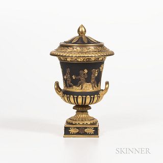 Wedgwood Gilded and Bronzed Black Basalt Campana Vase and Cover, England, c. 1885, relief of Bacchanalian Boys bordered with gadroon, f