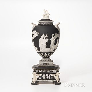 Wedgwood Black Jasper Dip Apotheosis of Homer Vase and Cover, England, 19th century, applied white relief, the cover with Pegasus finia