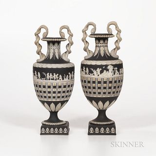 Two Wedgwood Tricolor Diceware Jasper Dip Snake-handle Vases, England, 19th century, applied white relief to a black ground with yellow