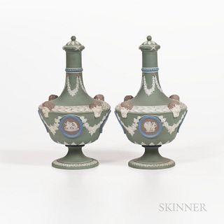 Pair of Wedgwood Four-color Jasper Dip Barber Bottles and Covers, England, 19th century, applied white relief, green ground, and lilac