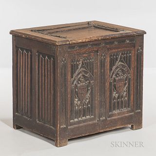 Gothic-style Carved Oak Coffer, late 19th/early 20th century, with a hinged lid, ht. 25 3/4, wd. 28 1/2, dp. 20 1/8 in.