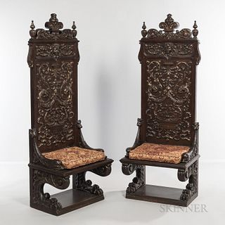 Pair of Renaissance Revival Oak Chairs, late 19th/early 20th century, each with carved acanthine scrollwork throughout, ht. 69 1/4, wd.