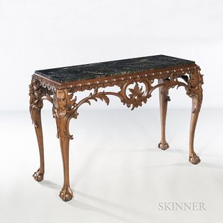 Georgian-style Marble-top Mahogany Table, with carved acanthus-capped scrollwork to apron on claw-and-ball feet, ht. 32, wd. 47, dp. 17