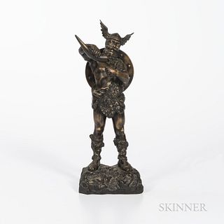 Bronze Figure of a Norseman, 19th century, the standing figure wearing a winged helmet and with shield at his back, set atop a rocky ba