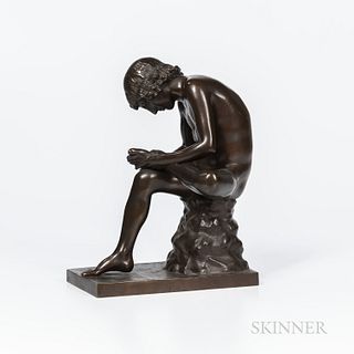 Barbedienne Bronze Figure of Spinario, France, 19th century, modeled as a seated man taking a thorn from his foot, dark brown patinatio