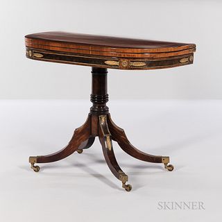 Regency Mahogany, Mahogany- and Kingwood-veneered, Ormolu-mounted Game Table, England, early 19th century, D-shaped top swivels and ope