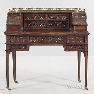 Carlton-style Mahogany Desk, late 19th/early 20th century, with an upper reticulated gallery and acanthus-carved accents to drawer fron