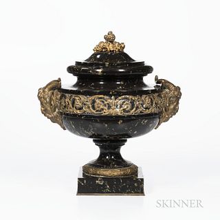 Gilt-bronze-mounted Marble Urn and Cover, 19th century, fruit finial and Bacchus head handles with a wide band of arabesque flowers, ht