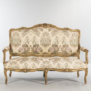 Louis XIV-style Giltwood Settee, late 19th/early 20th century, with carved foliate arabesques to frame, ht. 45 1/4, wd. 67, dp. 24 3/4
