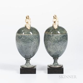 Pair of Wedgwood & Bentley Porphyry Vases and Covers, England, c. 1780, gilded white terra-cotta widow finials atop a goblet shape set