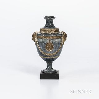 Neale Variegated Vase, England, c. 1780, black speckling to a white terra-cotta body with gilded relief of maiden head handles, foliate