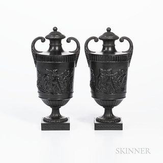 Pair of Wedgwood & Bentley Black Basalt Vases, England, c. 1780, each with scrolled handles and gadroon bands above Bacchanalian Boys i