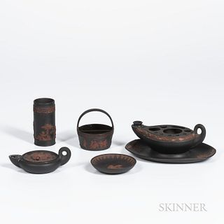 Five Wedgwood Black Basalt Items, England, 19th century, each with applied rosso antico relief, spill vase, ht. 3 5/8; basket, ht. 3 1/