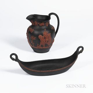 Two Wedgwood Black Basalt Items, England, 19th century, each with rosso antico applied relief, a club jug with Bacchanalian Boys, ht. 7