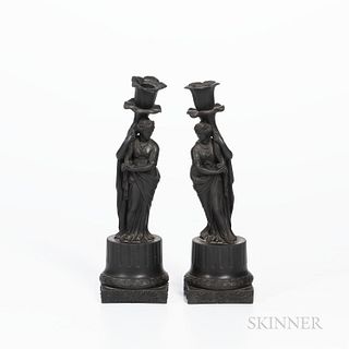 Pair of Wedgwood Black Basalt Figural Candlesticks, England, 19th century, each modeled standing and holding a cornucopia-form candle h