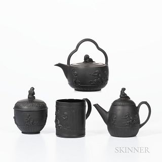 Four Wedgwood Black Basalt Items, England, late 18th century, each with depictions of children, a cylindrical mug, ht. 3 1/2; teakettle
