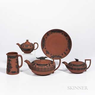 Five Wedgwood Egyptian Rosso Antico Items, England, 19th century, each with applied black basalt hieroglyphs in relief, two covered tea
