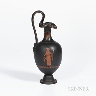 Wedgwood Encaustic Decorated Black Basalt Oenochoe Ewer, England, 19th century, scrolled handle with mask at terminal, ovoid shape with