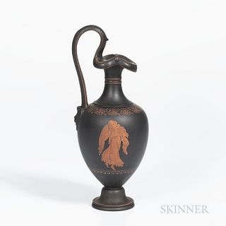 Wedgwood Encaustic Decorated Black Basalt Oenochoe Ewer, England, 19th century, scrolled handle terminating at a mask, iron red, black,
