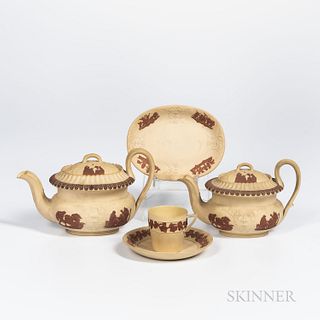 Four Wedgwood Caneware Tea Wares, England, each with applied rosso antico in relief, three with classical figures, two covered teapots,