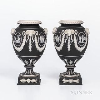 Pair of Wedgwood Black Jasper Dip Vases, England, mid-19th century, each with applied white classical medallions within floral festoons