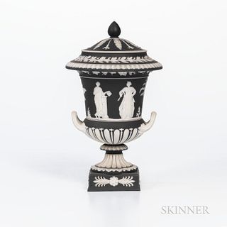 Wedgwood Black Jasper Dip Vase and Cover, England, 19th century, applied white classical figures in relief and with foliate borders, im