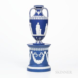 Wedgwood Dark Blue Jasper Dip Vase on a Drum Base, England, 19th century, applied white classical figures in relief to a vase bordered