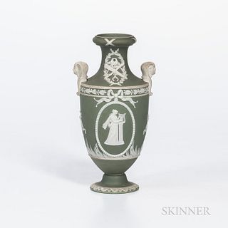 Wedgwood Green Jasper Dip Vase, England, 19th century, applied white relief with sphinx head handles, trophies, classical figures and f