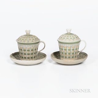 Pair of Wedgwood Tricolor Diceware Jasper Dip Cups, Covers, and Saucers, England, 19th century, applied white relief to a green ground