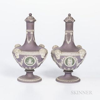 Pair of Wedgwood Tricolor Jasper Dip Barber Bottles and Covers, England, 19th century, each with applied white relief to a lilac ground
