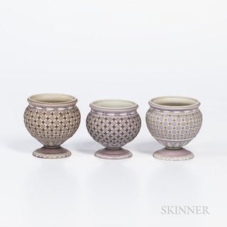 Three Wedgwood Tricolor Diceware Jasper Dip Jars, England, early 19th century, each with applied white relief and lilac ground, two wit