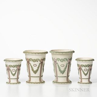 Four Similar Wedgwood Tricolor Jasper Vases, England, 19th century, each solid white ground with applied relief in white, lilac and gre