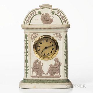 Wedgwood Tricolor Jasper Clock Case, England, late 19th/early 20th century, white ground with applied lilac figures and inscription Tem