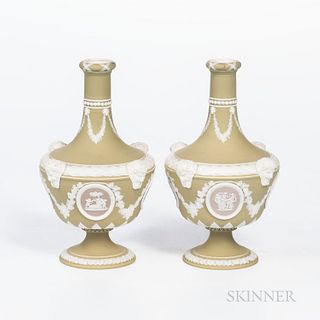 Pair of Wedgwood Tricolor Jasper Barber Bottles, England, late 19th century, green ground with lilac medallions and applied relief incl