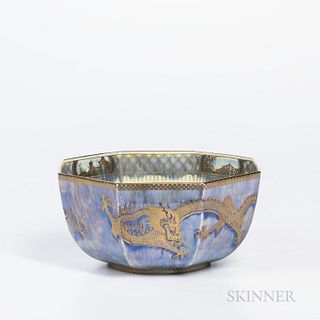 Wedgwood Dragon Lustre Bowl, England, c. 1920, octagonal shape with gilt and colored dragons to a mottled light blue ground, mother-of-