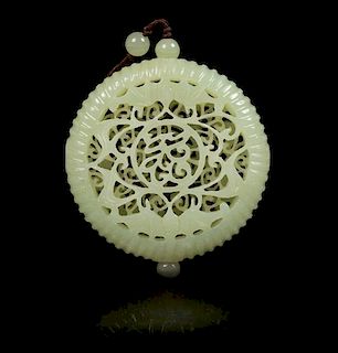 A Pierce Carved Jade Pendant Diameter 2 1/8 inches.