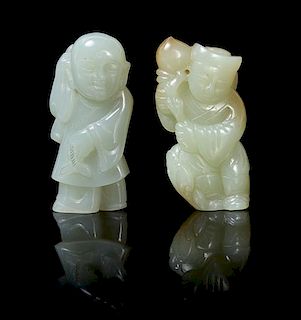 Two Carved Jade Figural Toggles Height of taller 2 1/8 inches.