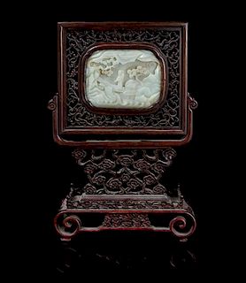 * A Carved Jade Plaque Height of stone 3 1/4 x width 4 1/4 inches.