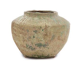 A Green Glazed Pottery Jar LIKELY HAN DYNASTY Height 4 1/2 inches.