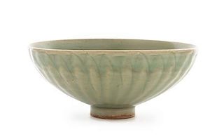 A Longquan Celadon Glazed Lotus-Form Bowl Diameter 6 3/4 inches.