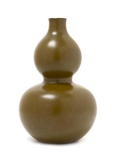 A Teadust Glazed Porcelain Vase Height 7 1/2 inches.