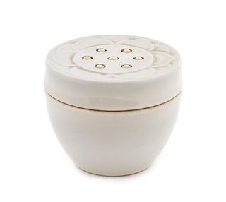 A White Glazed Porcelain Jar and Cover Height 2 1/8 inches.
