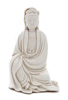 * A Blanc-de-Chine Porcelain Figure of Seated Guanyin LIKELY 19TH CENTURY OR EARLIER Height 9 1/2 inches.