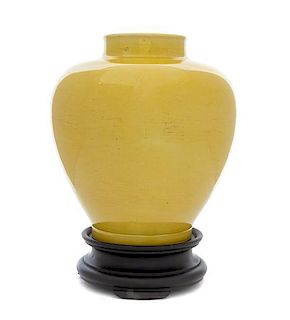 * A Monochrome Yellow Glazed Porcelain Jar Height 9 inches.