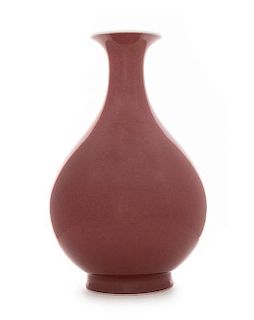 A Peach-Bloom Glazed Porcelain Vase, Yuhuchun ping Height 12 1/8 inches.