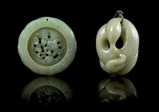 * A Carved Jade Pendant Diameter of first 2 inches.